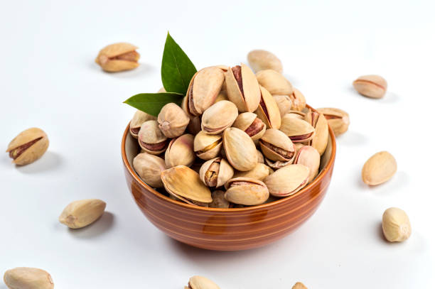 Pistachio in bowl on white background Raw Pistachio Roasted & Salted - 400gm - Image 1